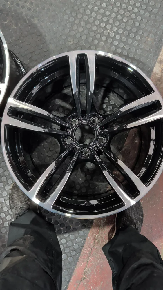 Gloss black finished face